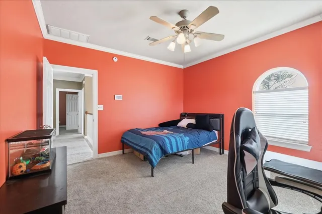a living room with furniture a table and a chandelier