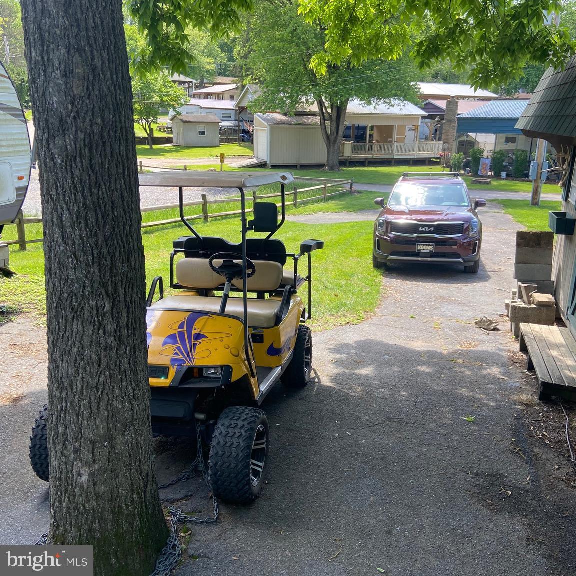 42 Boo Boo Boulevard Falling Waters, WV 25419 - Photo 13 of 24 a view of a yard with furniture and a fire pit