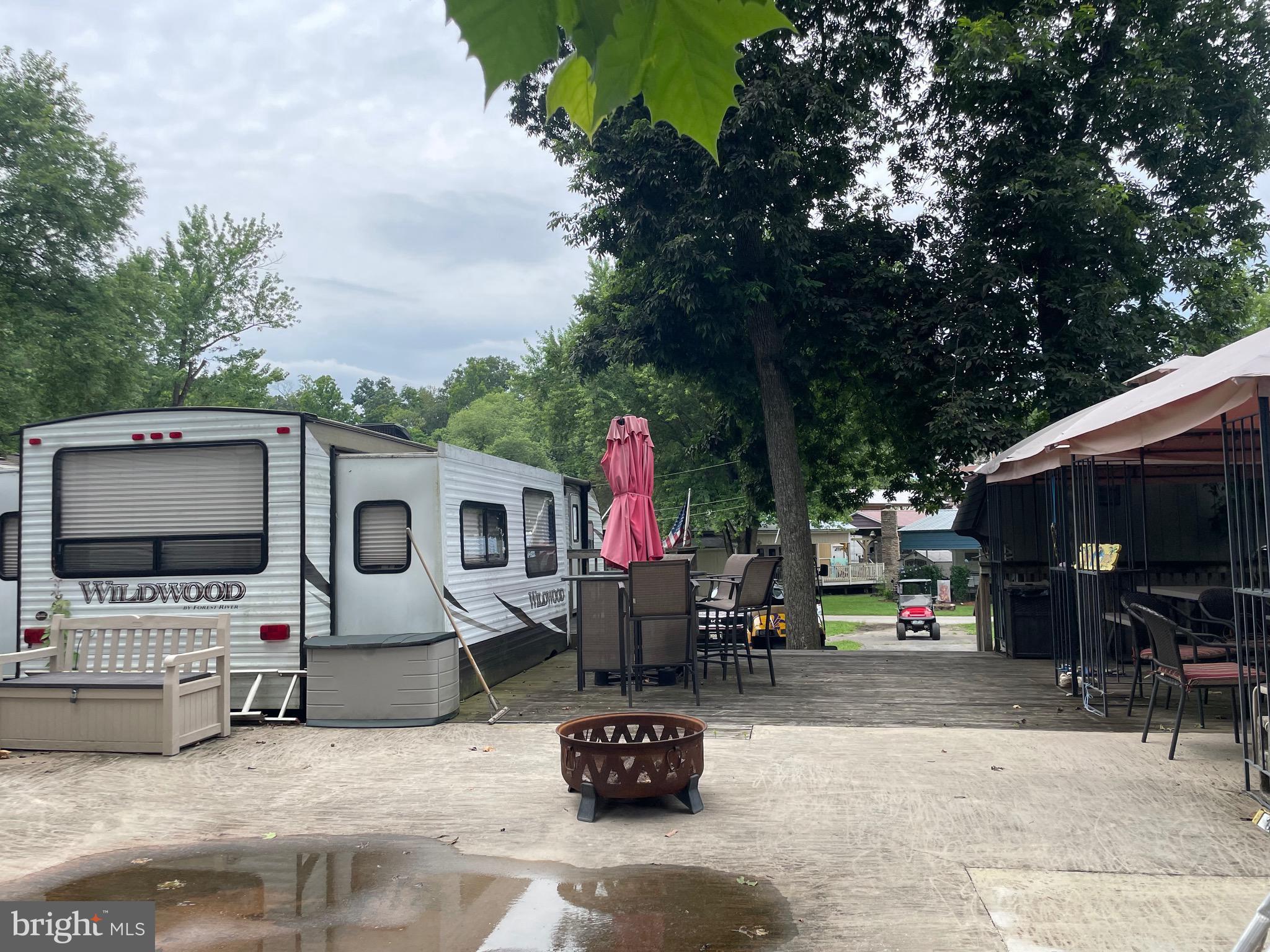 42 Boo Boo Boulevard Falling Waters, WV 25419 - Photo 18 of 24 a living room with furniture and a flat screen tv
