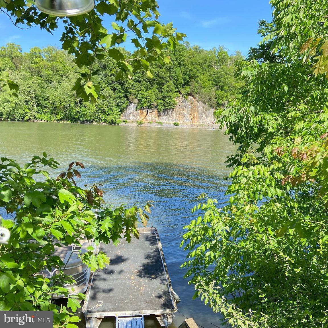 42 Boo Boo Boulevard Falling Waters, WV 25419 - Photo 6 of 24 a view of a lake with a lake