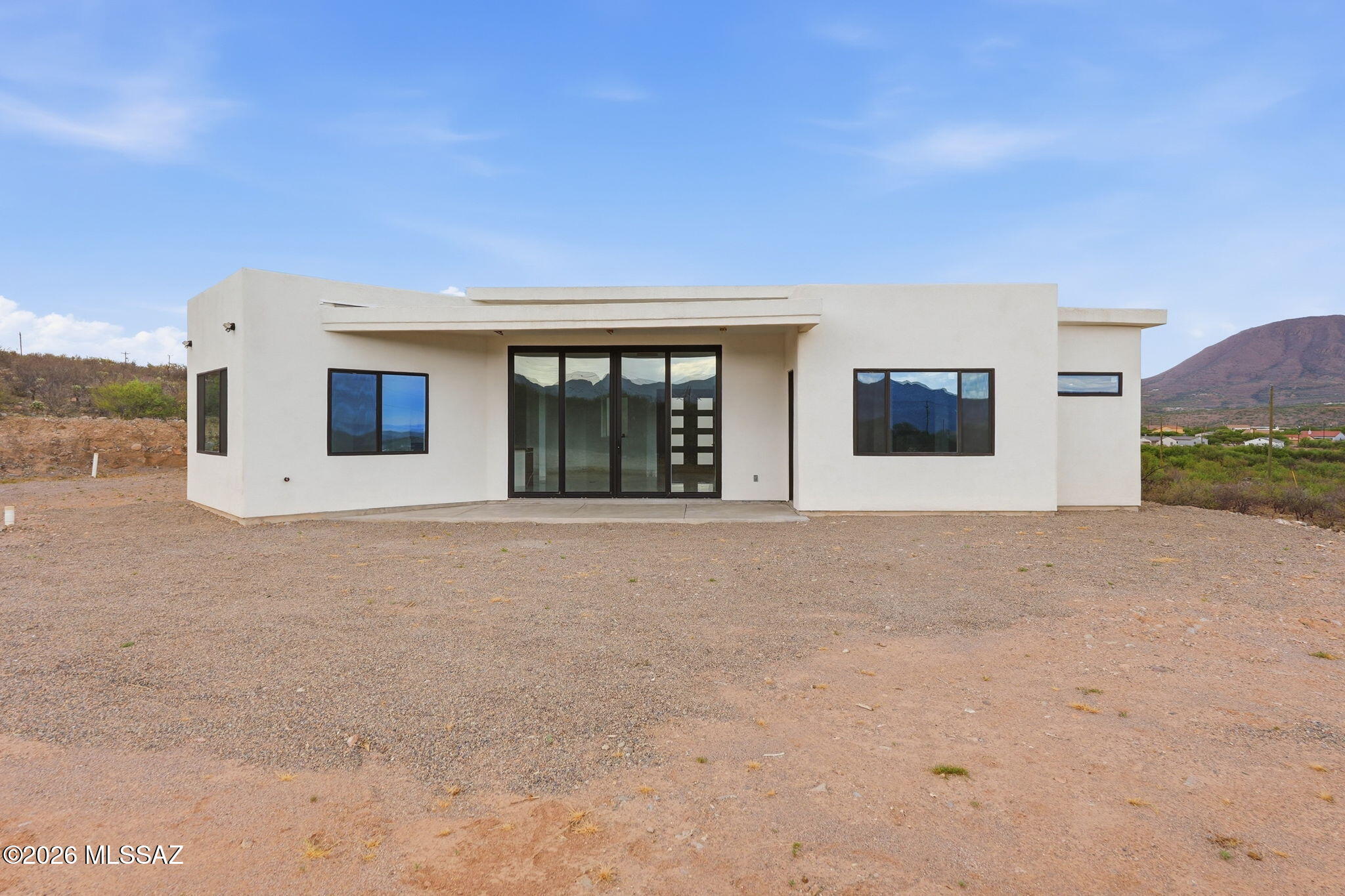 1786 Peralta Court Rio Rico, AZ 85648 - Photo 6 of 50 front view of a house with a yard