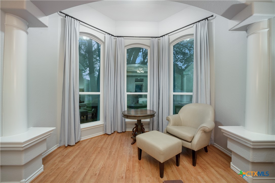 103 Sierra Ridge Drive San Marcos, TX 78666 - Photo 22 of 43 a living room with furniture and a large window