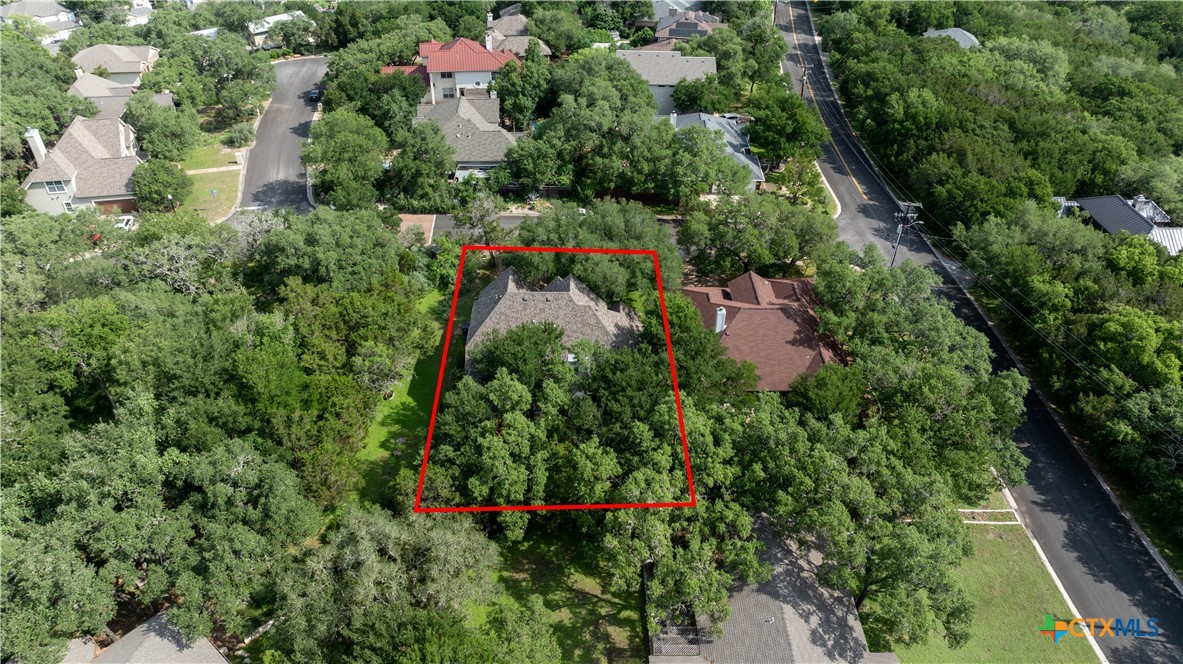 103 Sierra Ridge Drive San Marcos, TX 78666 - Photo 39 of 43 an aerial view of residential house with outdoor space and trees all around