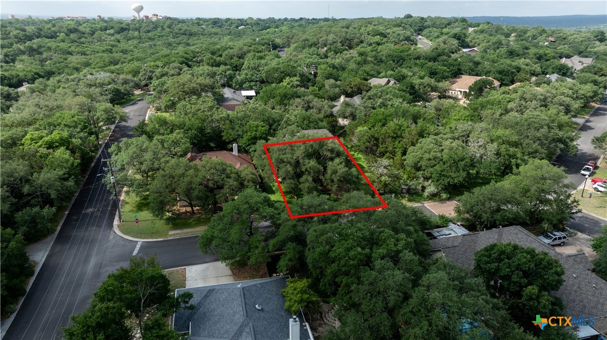 103 Sierra Ridge Drive San Marcos, TX 78666 - Photo 43 of 43 an aerial view of a house with yard