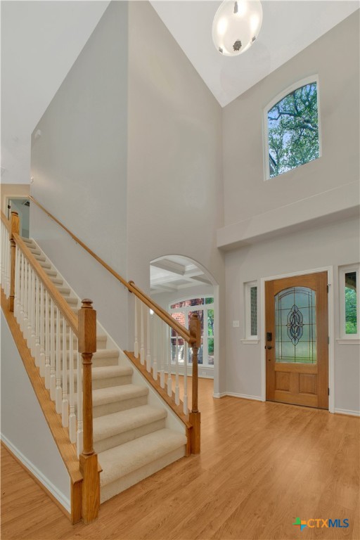 103 Sierra Ridge Drive San Marcos, TX 78666 - Photo 6 of 43 a view of an entryway with wooden floor