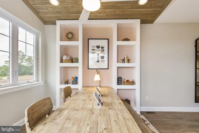a view of a dining room with furniture