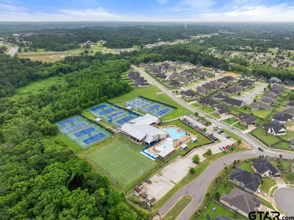 a view of a table and chairs in patio