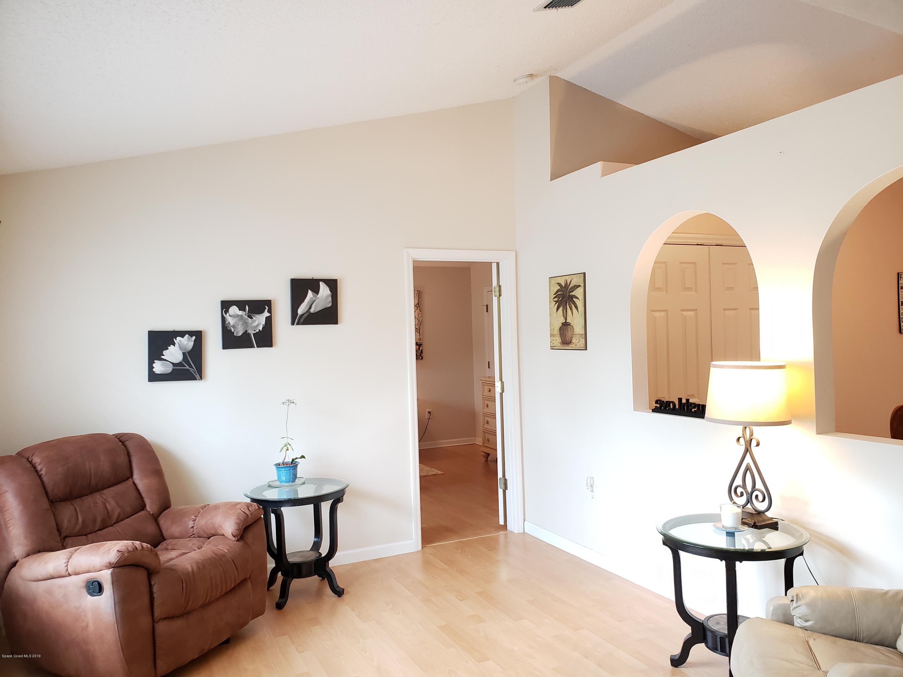 6145 Adina Road Cocoa, FL 32927 - Photo 15 of 34 a living room with furniture