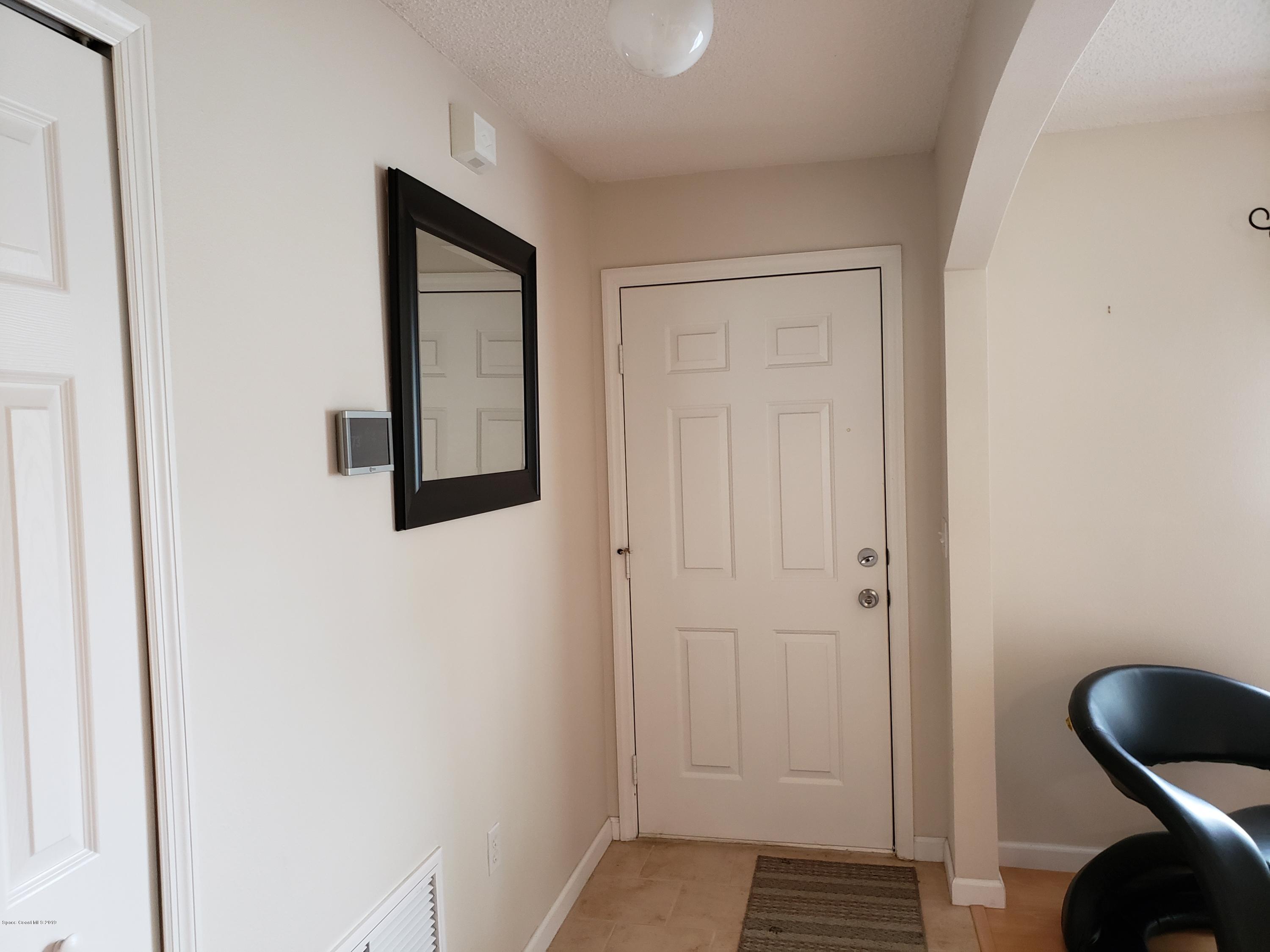 6145 Adina Road Cocoa, FL 32927 - Photo 20 of 34 a bathroom with a toilet