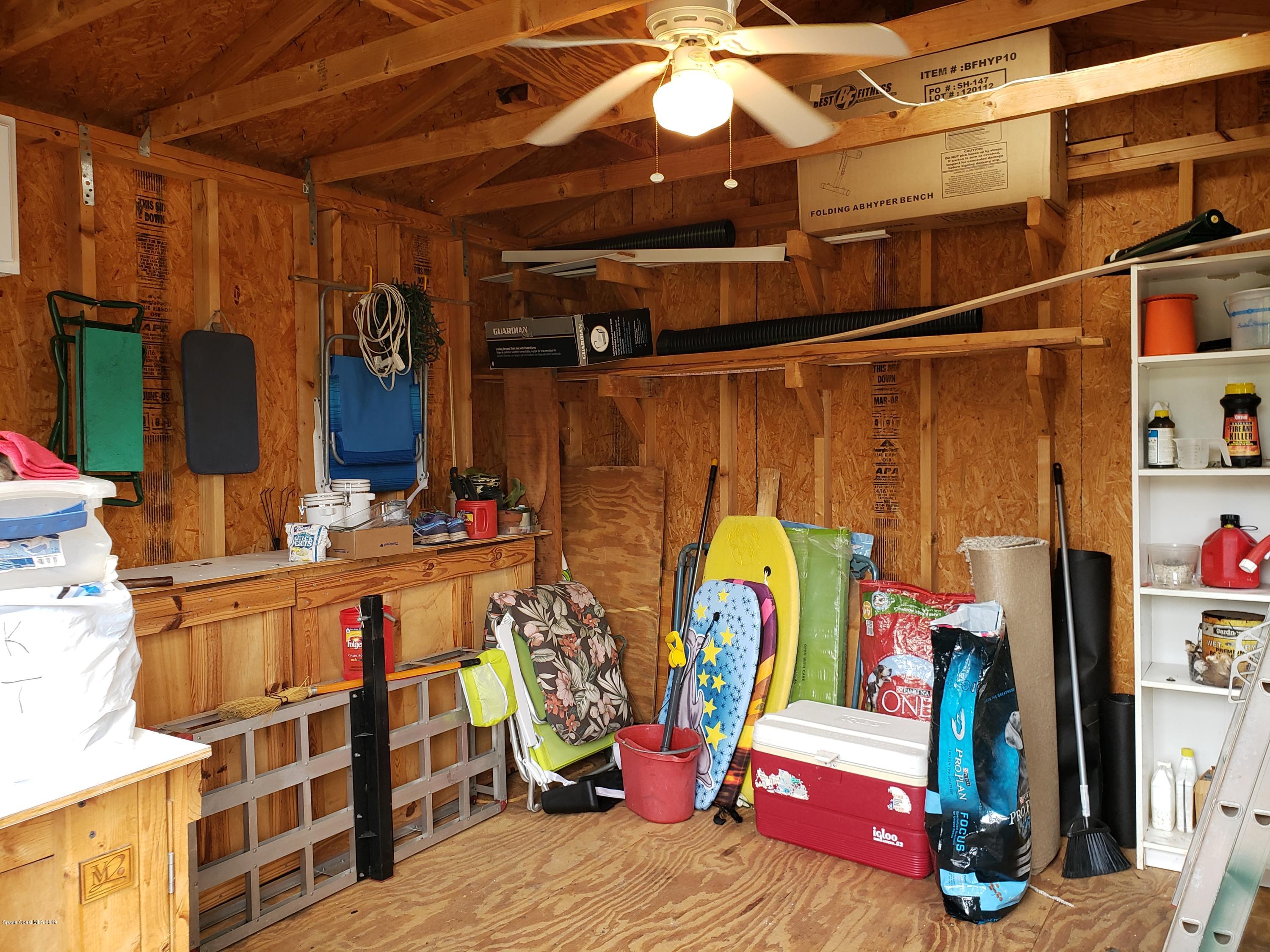 6145 Adina Road Cocoa, FL 32927 - Photo 25 of 34 a view of storage and utility room