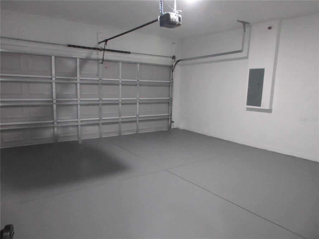 6765 Southwest 152nd Lane Road Ocala, FL 34473 - Photo 13 of 14 a view of an empty room with a window