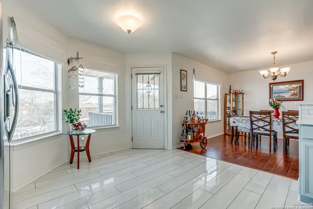 a kitchen with a sink stove and microwave