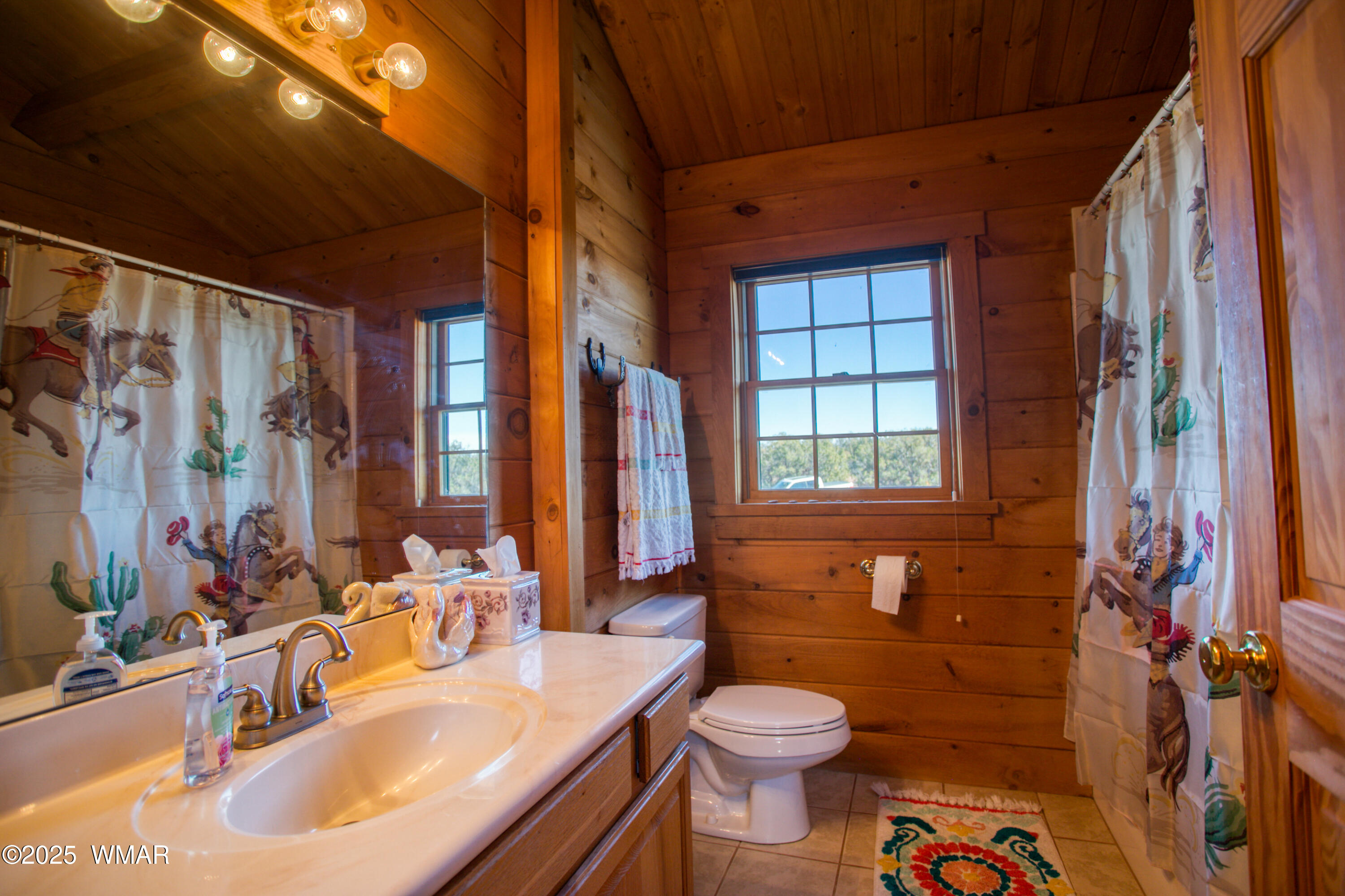 8555 Reata Lane Snowflake, AZ 85937 - Photo 35 of 88 a bathroom with a sink toilet tub and shower
