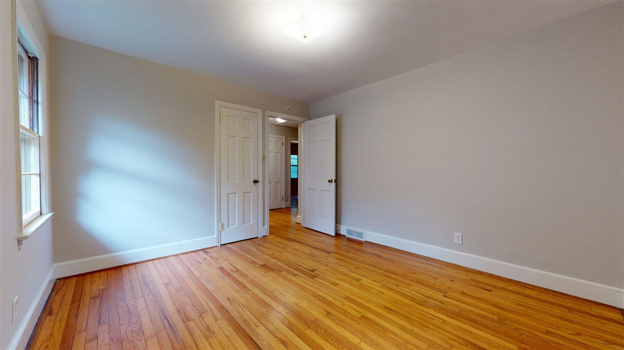 2516 North Roxboro Street Durham, NC 27704 - Photo 11 of 24 The front bedroom is 12.3x11.2 and has a nice closet. Bedroom