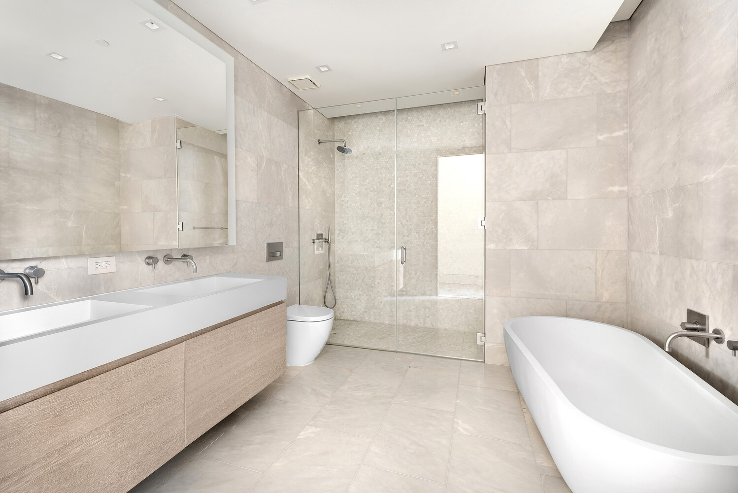 49 Chambers Street, Unit 8A Manhattan, NY 10007 - Photo 5 of 7 a spacious bathroom with a bathtub shower sink and toilet
