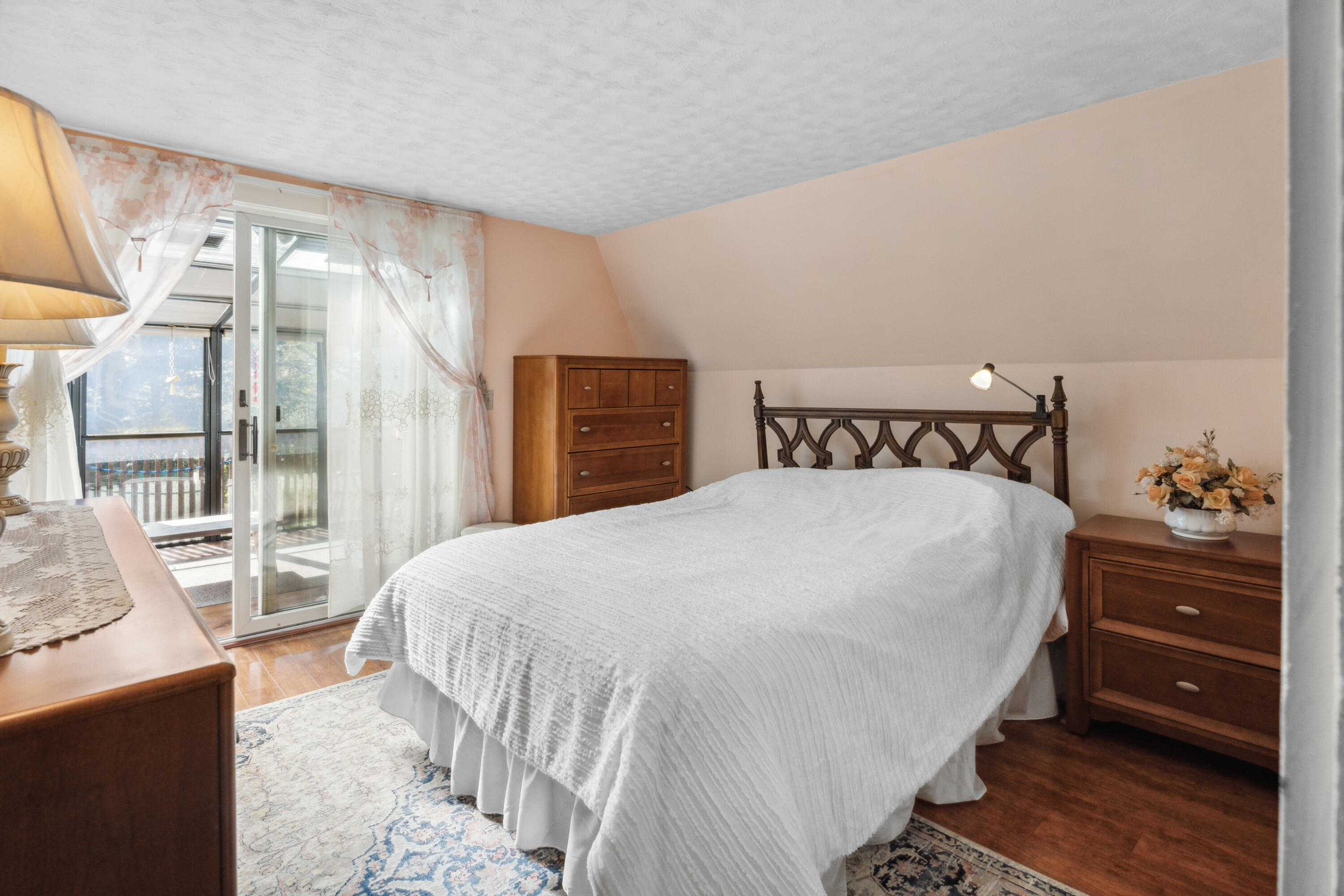 5 Bell Road Bourne, MA 02532 - Photo 14 of 26 a bedroom with a bed and a window