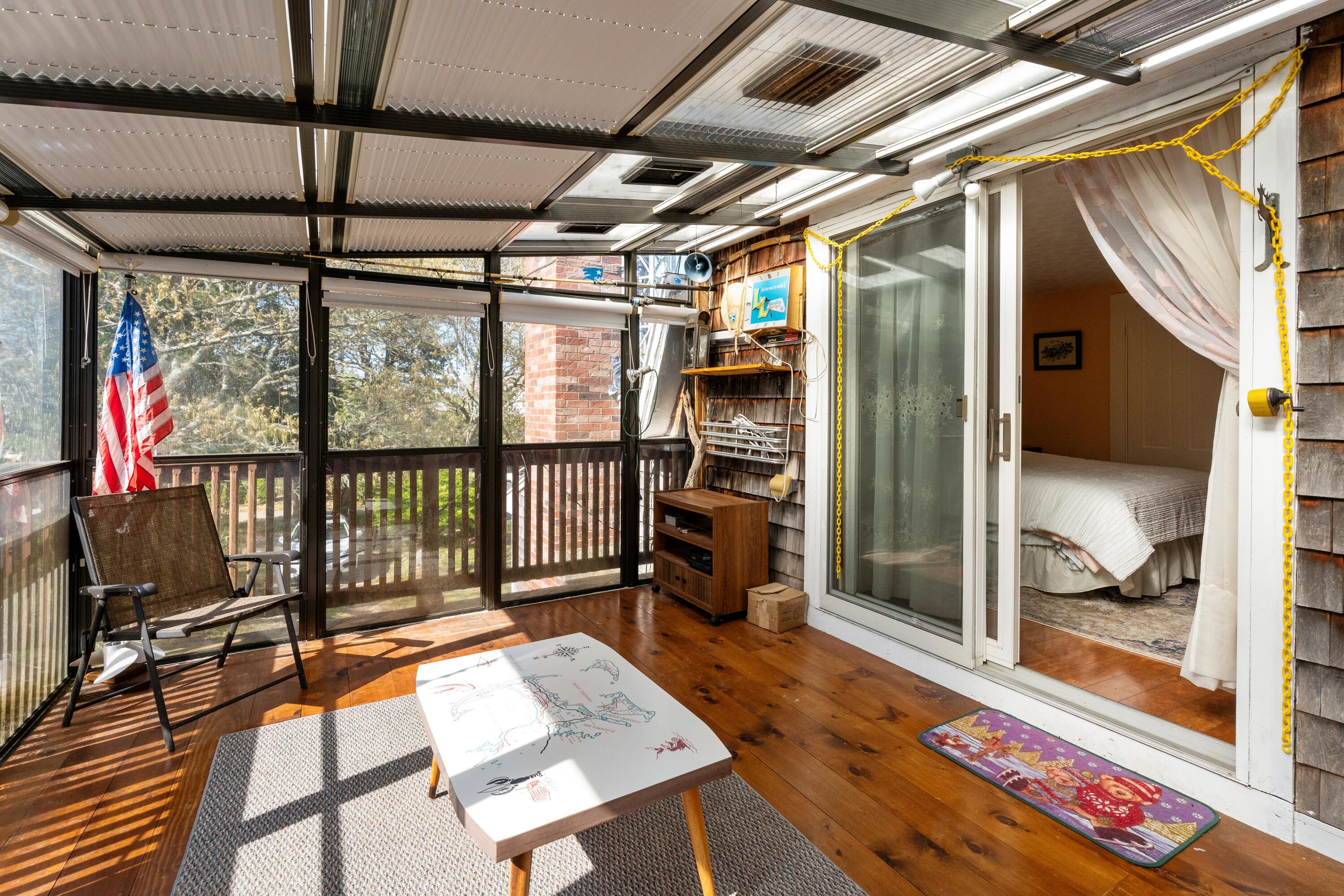 5 Bell Road Bourne, MA 02532 - Photo 15 of 26 a picture of a living room with a balcony