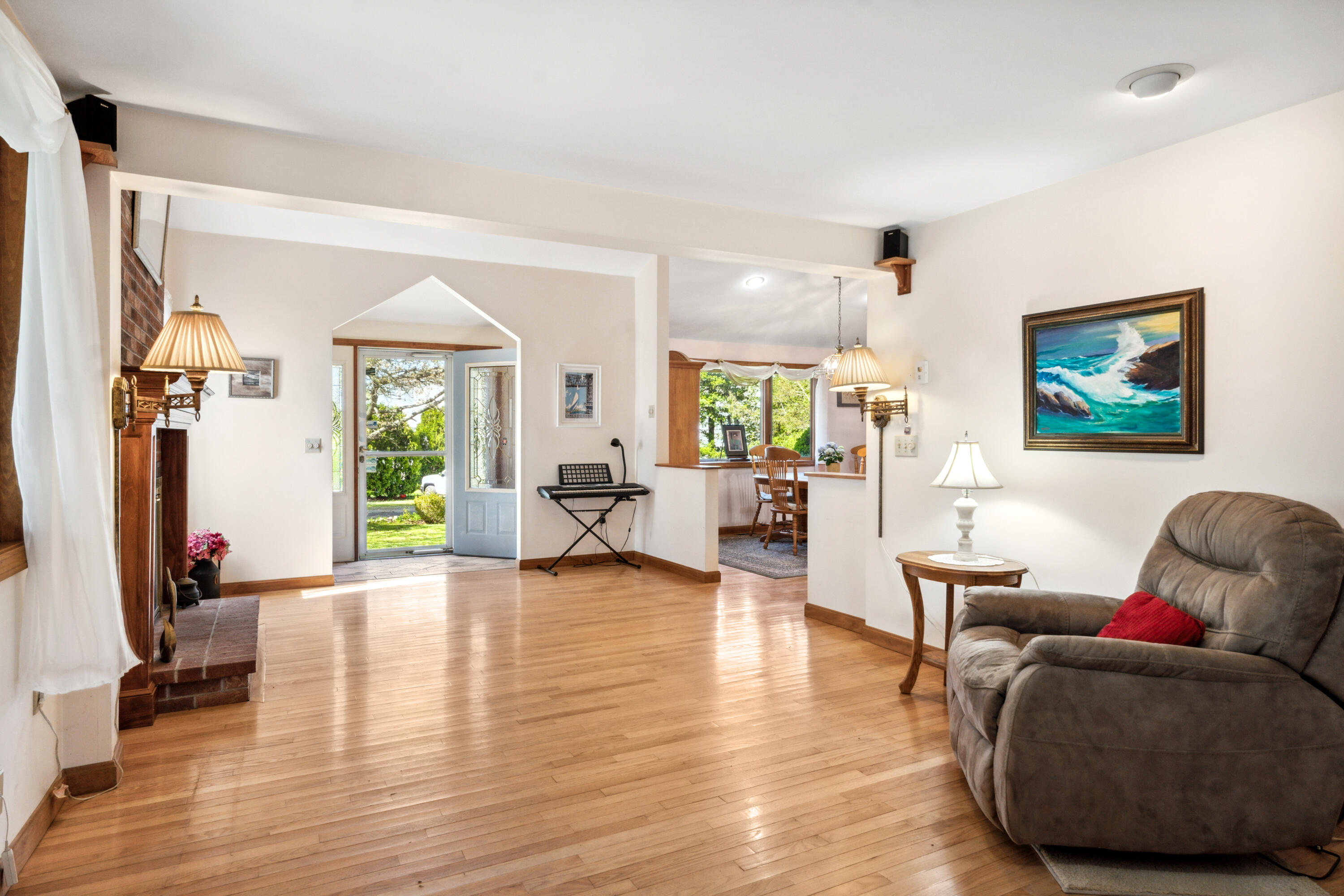5 Bell Road Bourne, MA 02532 - Photo 4 of 26 a living room with furniture and a flat screen tv