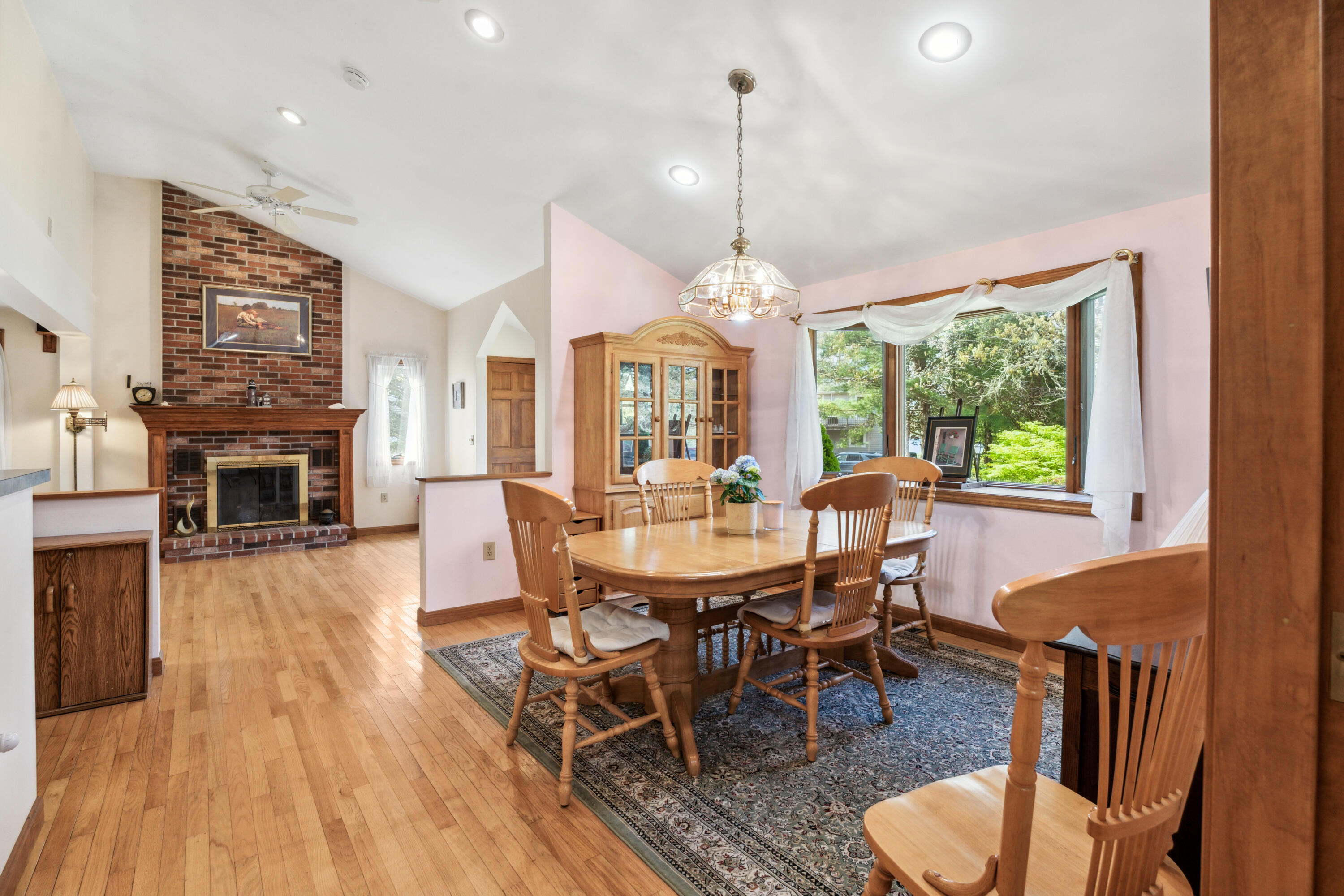 5 Bell Road Bourne, MA 02532 - Photo 6 of 26 a view of a dining room with furniture window and wooden floor