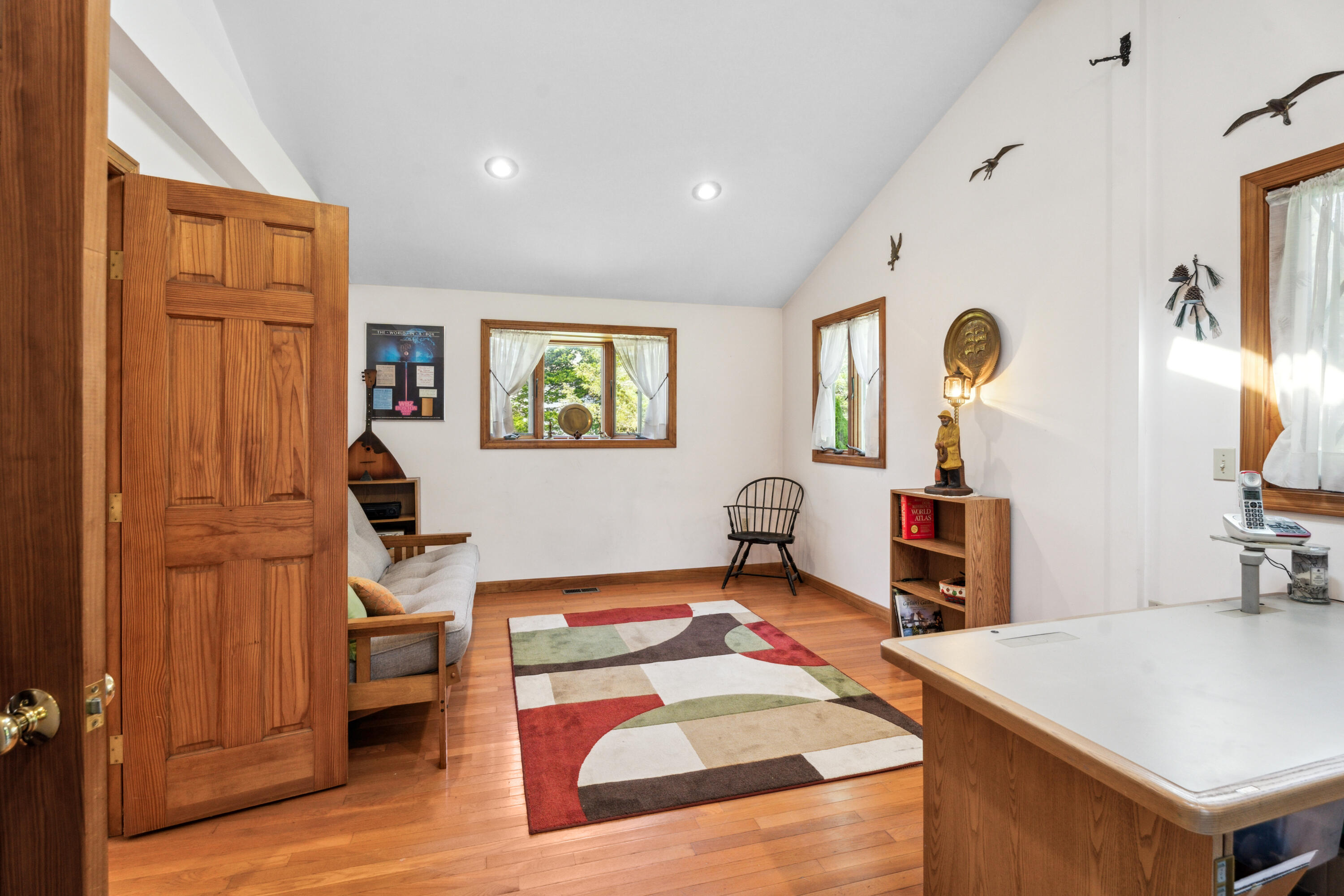 5 Bell Road Bourne, MA 02532 - Photo 7 of 26 a living room with furniture and a table
