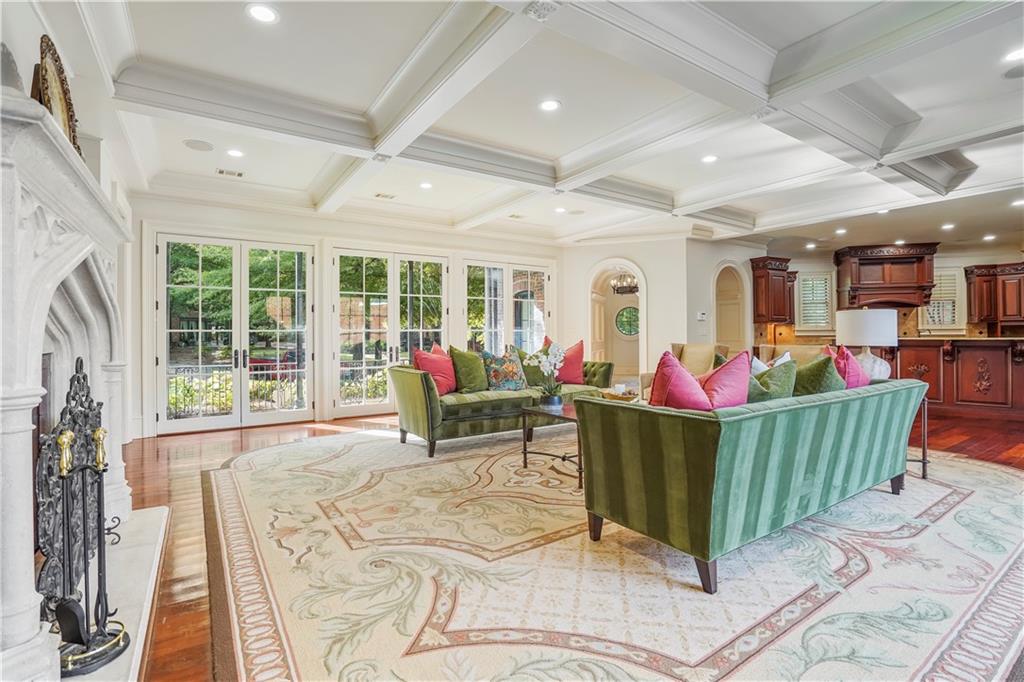 5102 Park Street Covington, GA 30014 - Photo 11 of 97 a living room filled with furniture and a large window