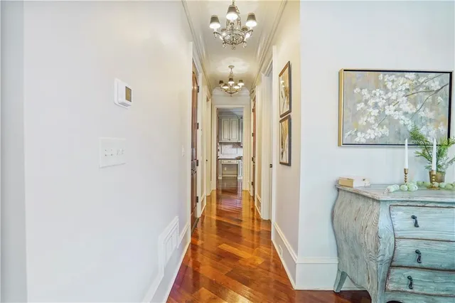 a living room with furniture a ceiling fan and a rug