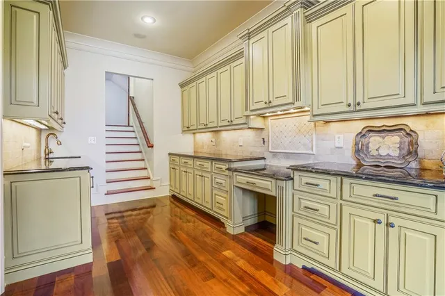 a bath tub sitting next to a window