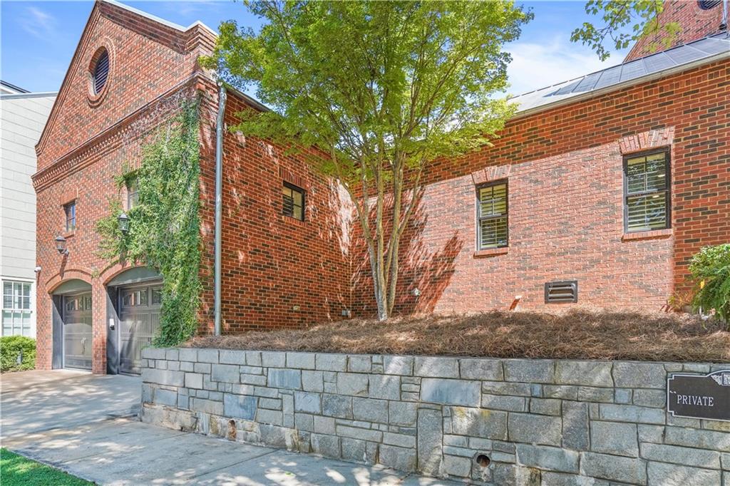5102 Park Street Covington, GA 30014 - Photo 3 of 97 a front view of a house with a tree