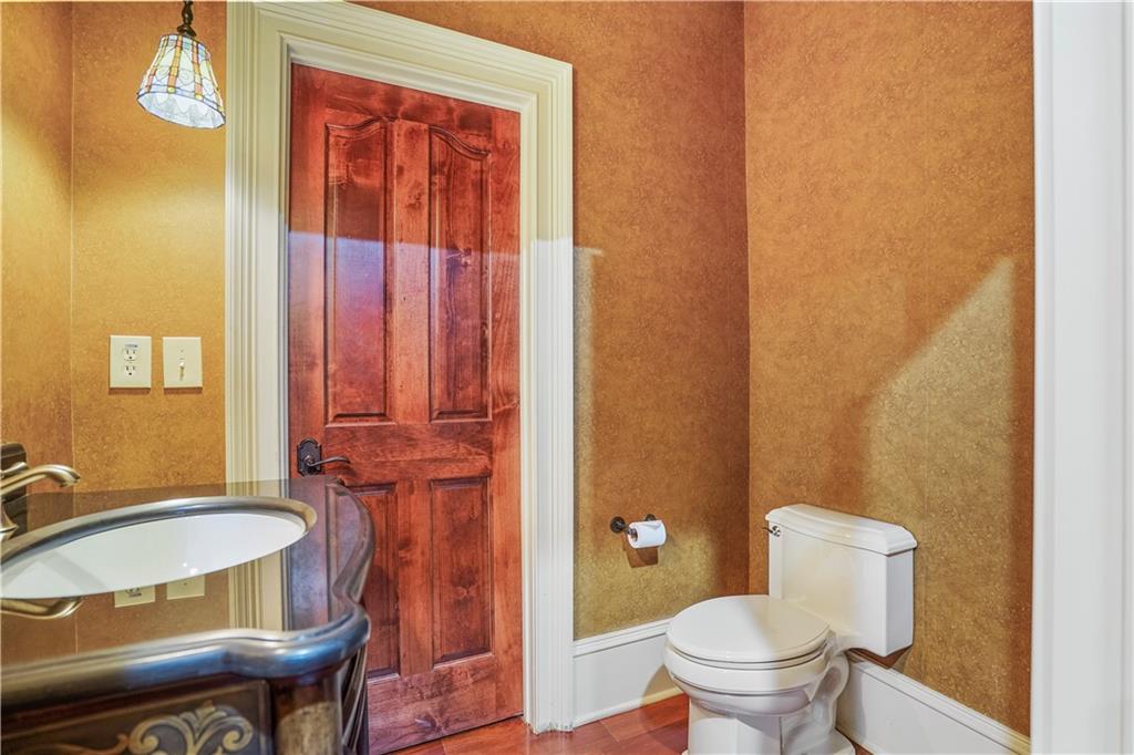 5102 Park Street Covington, GA 30014 - Photo 31 of 97 a bathroom with a sink and a toilet