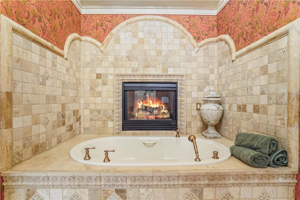 5102 Park Street Covington, GA 30014 - Photo 39 of 97 a bath tub sitting next to a window