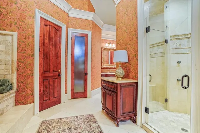 a kitchen with stainless steel appliances granite countertop a refrigerator stove and sink