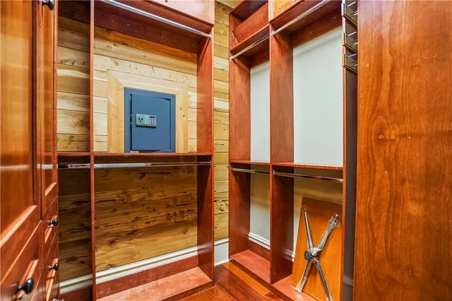 a view of a kitchen with refrigerator and toys