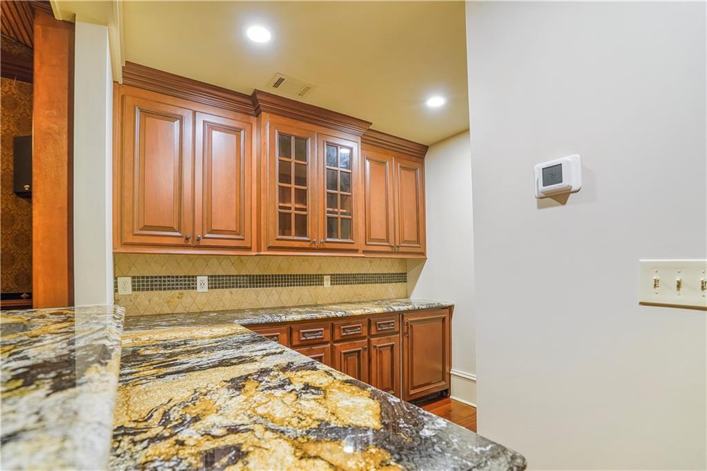 5102 Park Street Covington, GA 30014 - Photo 46 of 97 a view of a kitchen with wooden floor and a window