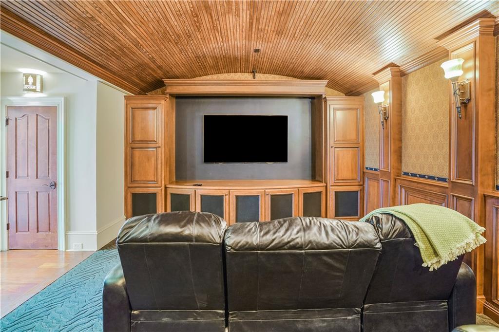5102 Park Street Covington, GA 30014 - Photo 49 of 97 a living room with a balcony furniture and a fireplace