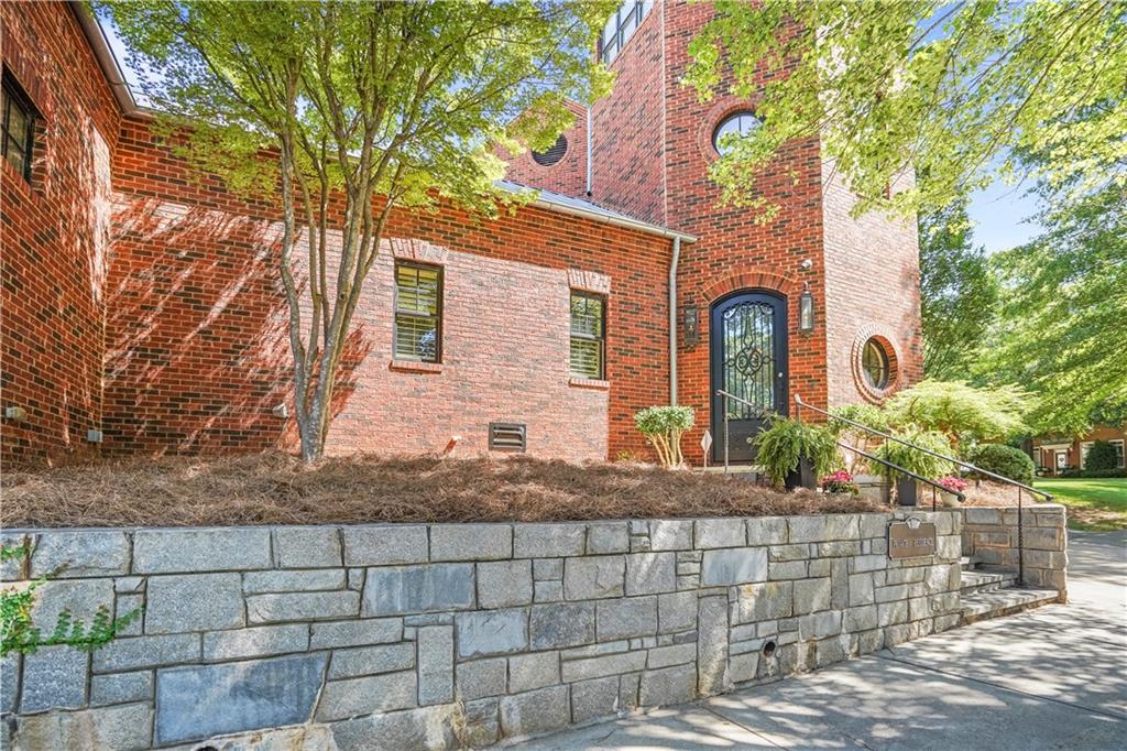 5102 Park Street Covington, GA 30014 - Photo 5 of 97 a front view of a house with garden