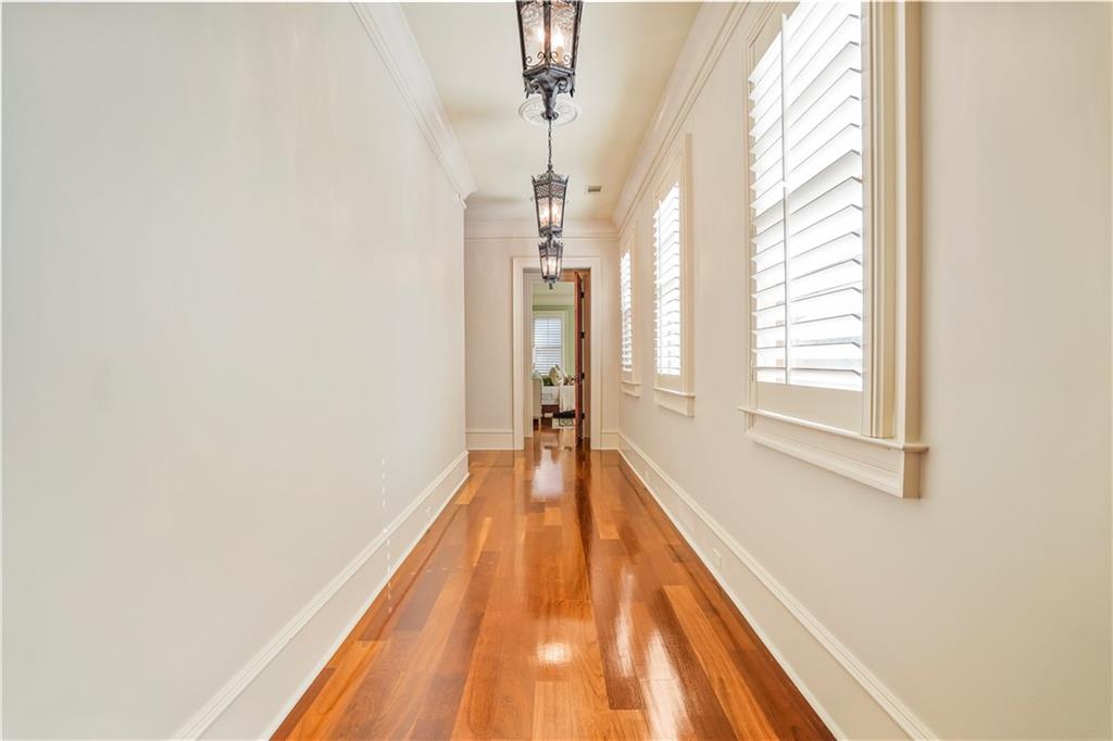 5102 Park Street Covington, GA 30014 - Photo 60 of 97 a view of a bedroom with wooden floor and a window