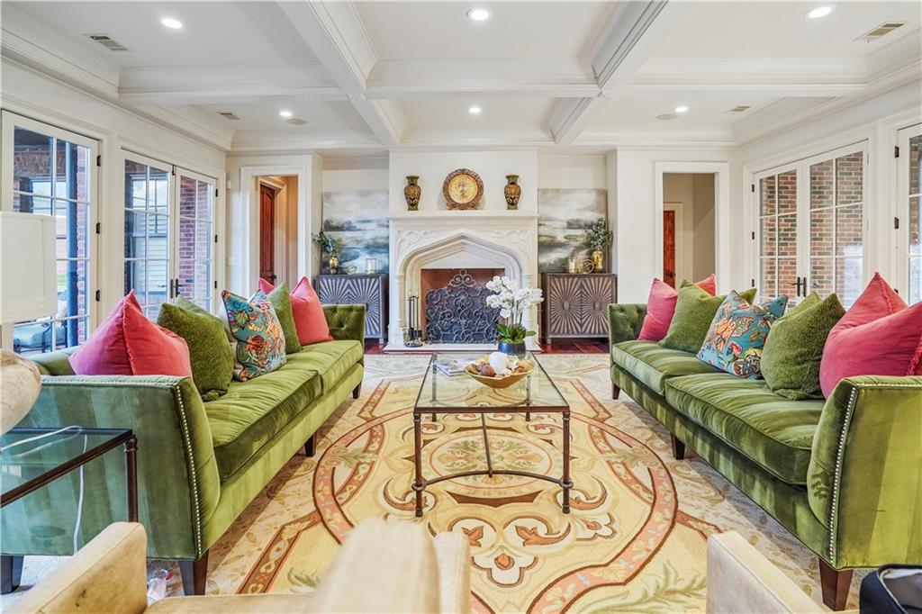 5102 Park Street Covington, GA 30014 - Photo 9 of 97 a living room with furniture and a fireplace