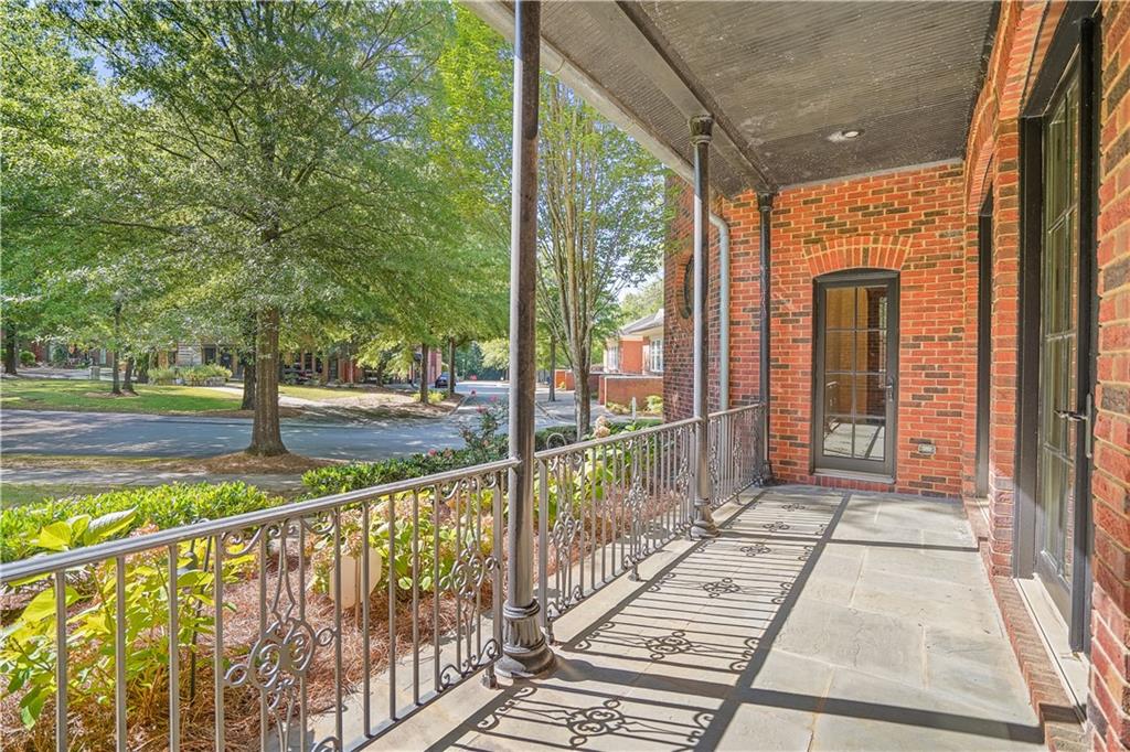 5102 Park Street Covington, GA 30014 - Photo 93 of 97 a view of a porch with wooden floor and fence