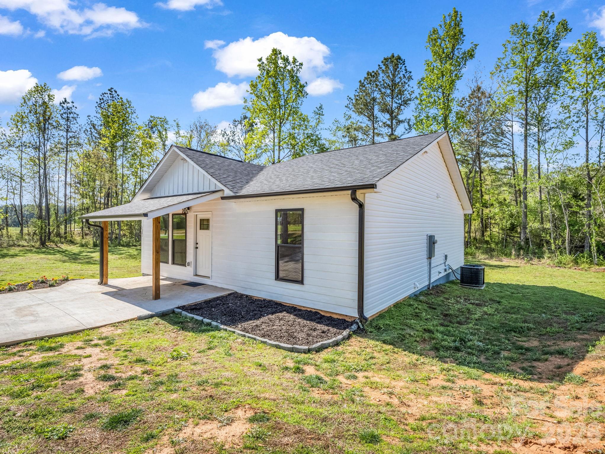 1081 Mt Lebanon Church Road Bostic, NC 28018 - Photo 31 of 47 a view of a house with backyard and sitting area