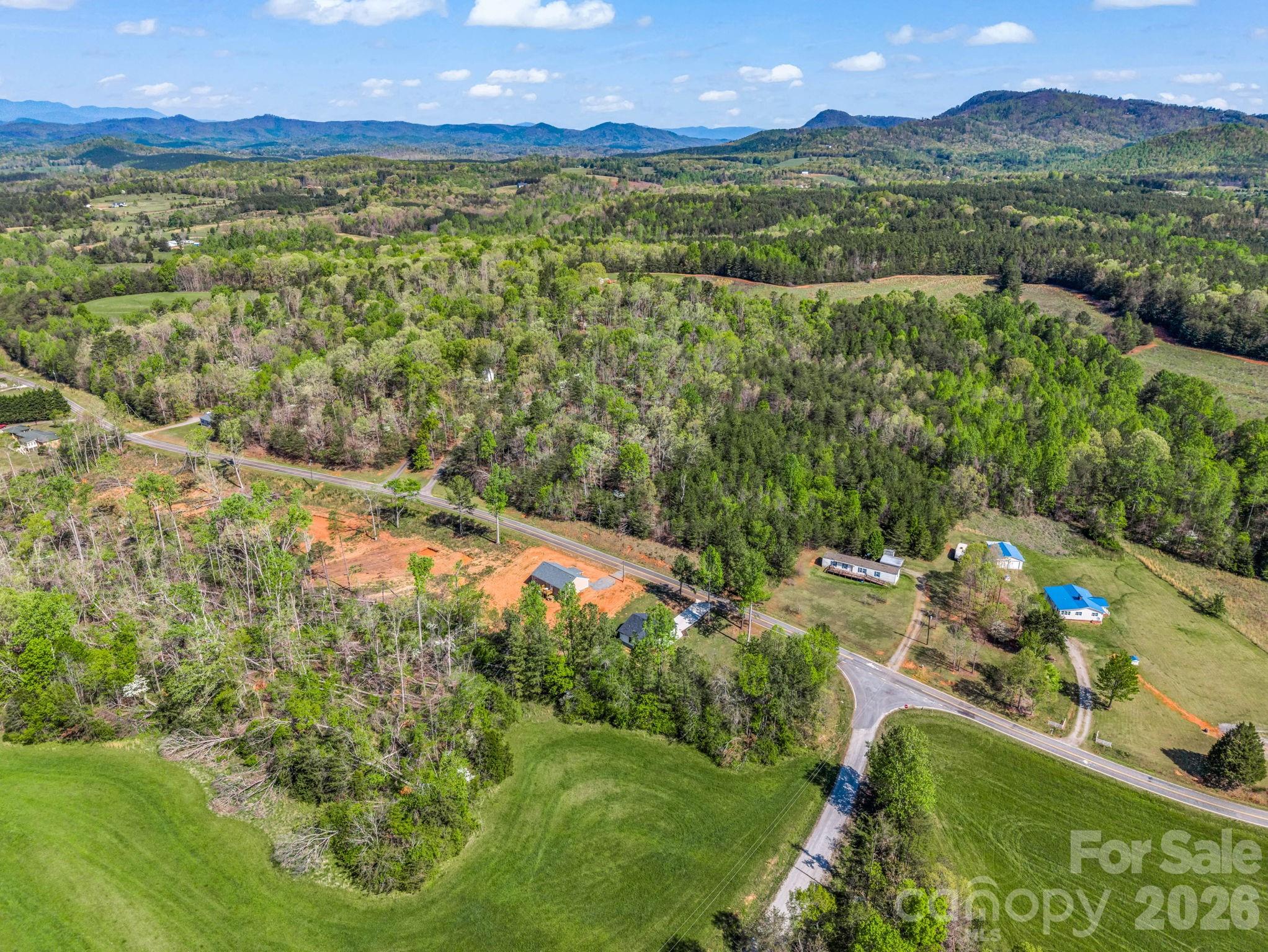 1081 Mt Lebanon Church Road Bostic, NC 28018 - Photo 43 of 47 a view of a lake with a mountain