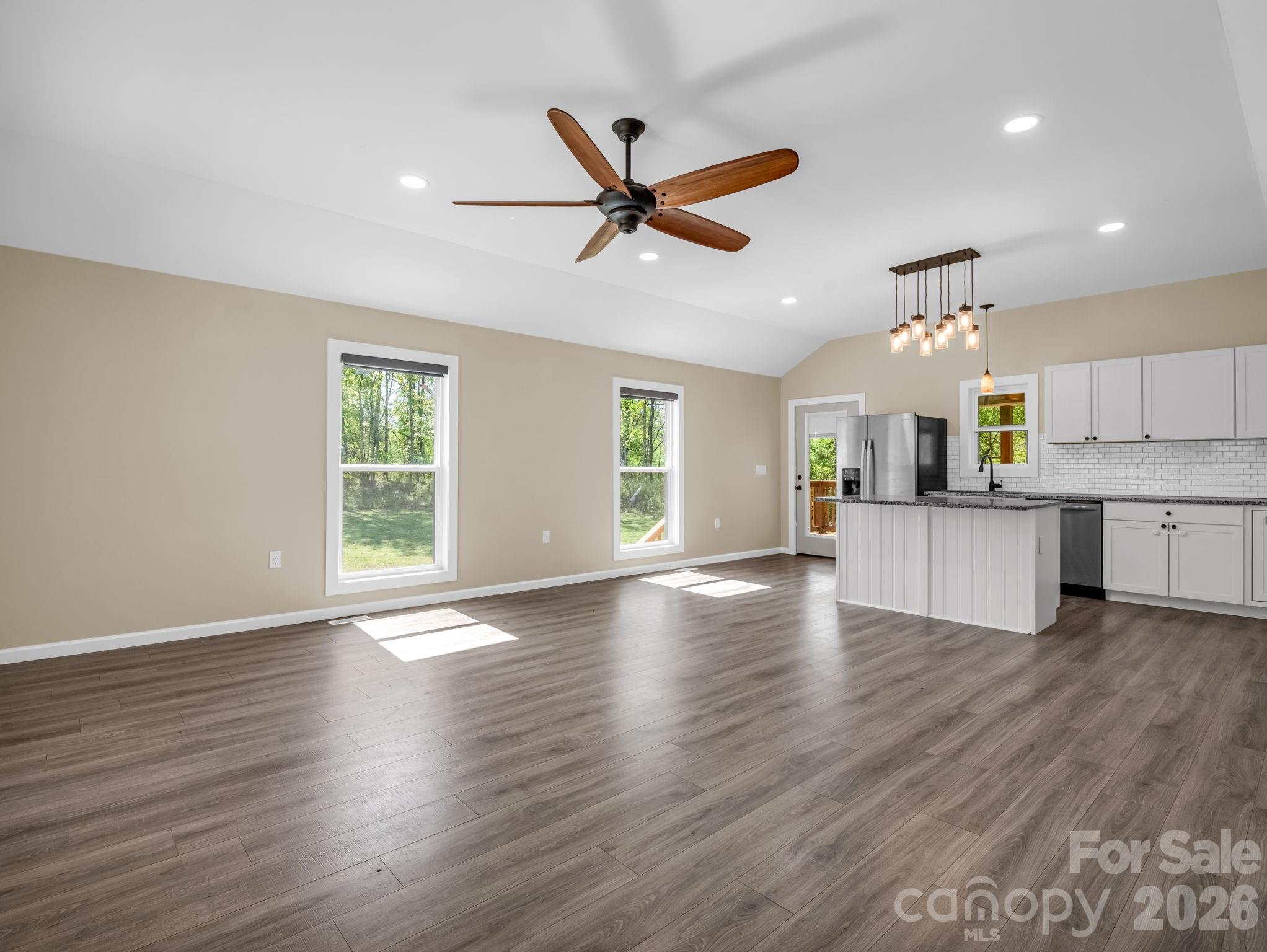 1081 Mt Lebanon Church Road Bostic, NC 28018 - Photo 5 of 47 a view of a big room with wooden floor and windows