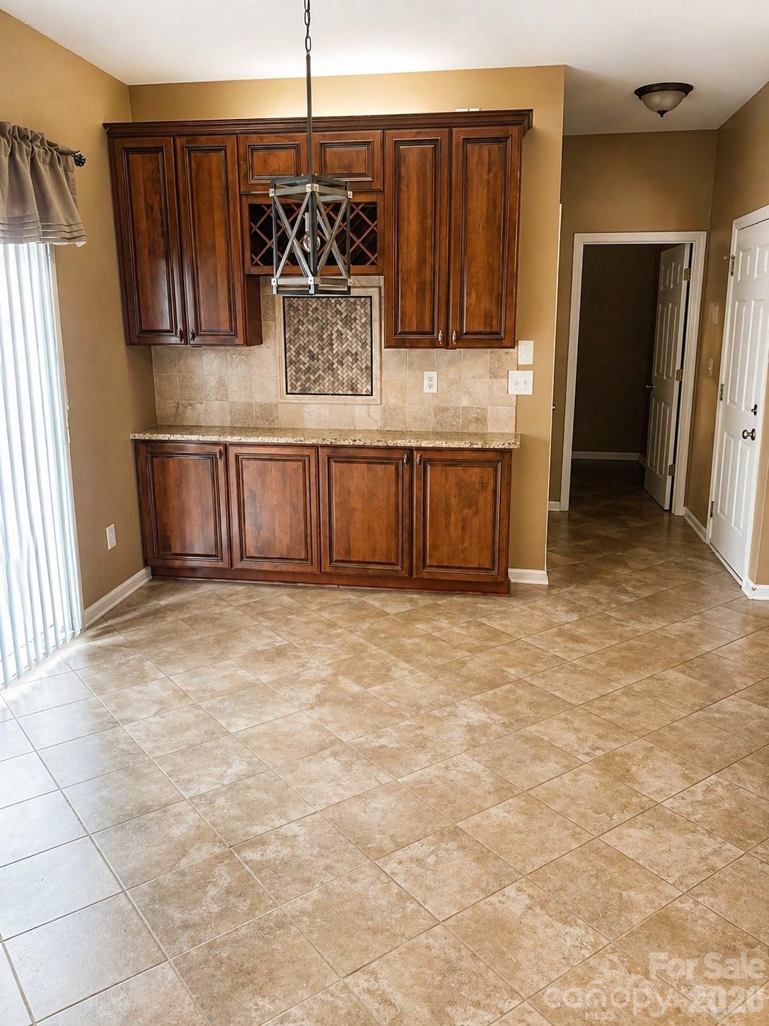 6006 Brook Valley Run Monroe, NC 28110 - Photo 6 of 27 a view of kitchen with cabinets