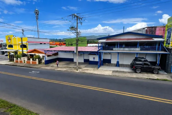 a view of a street with sitting area