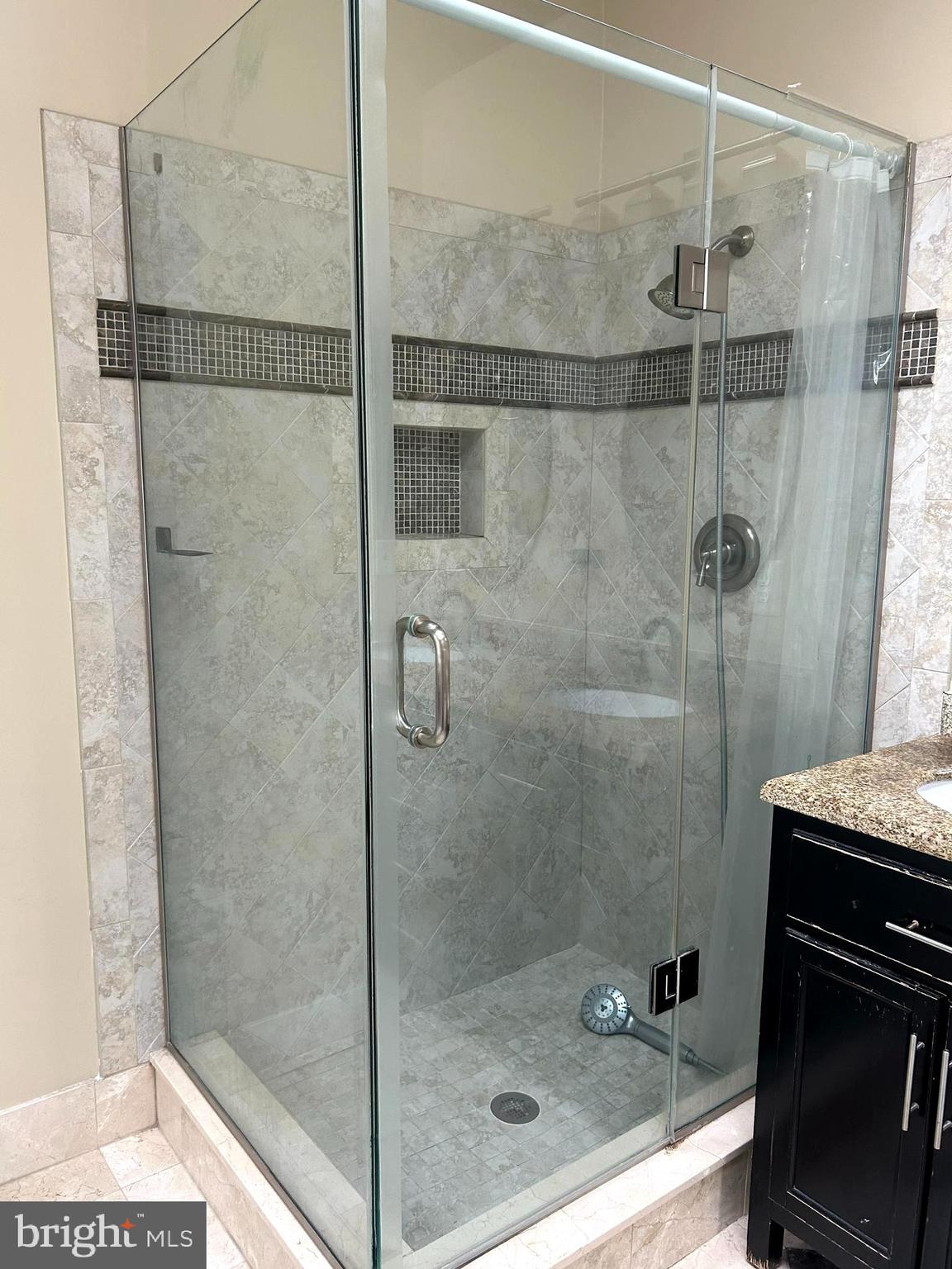 4658 Buckhorn Ridge Fairfax, VA 22030 - Photo 26 of 35 a bathroom with a shower