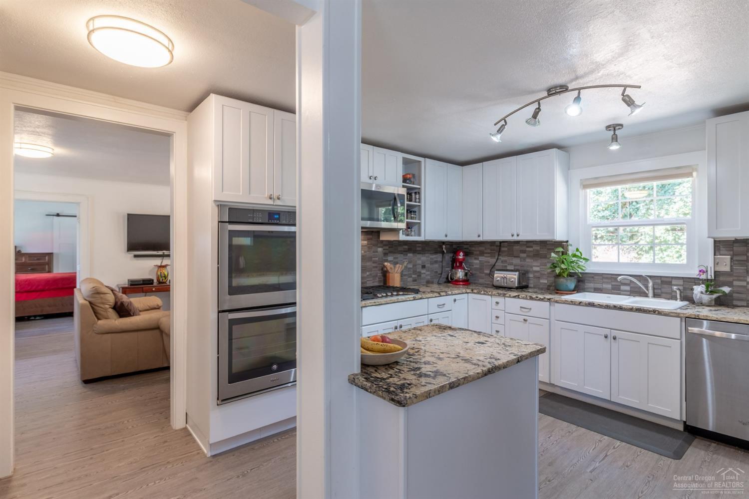 660 Level Lane Springfield, OR 97477 - Photo 18 of 23 a kitchen with a sink appliances and cabinets