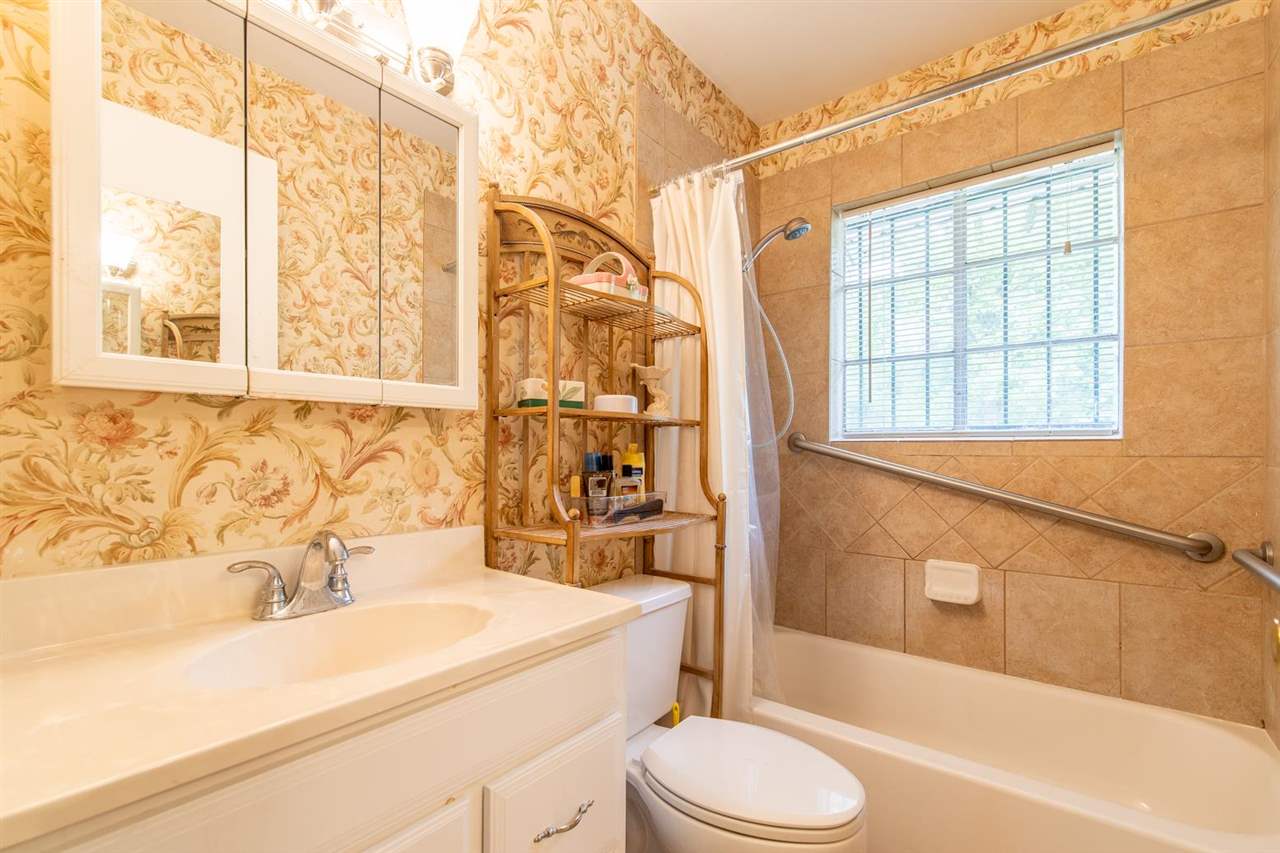 1191 Colonial Road Memphis, TN 38117 - Photo 17 of 24 Newly Tiled Floors and Shower Surround, New Vanity.