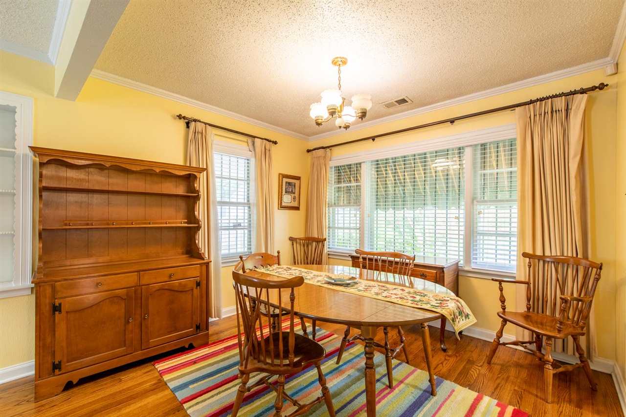 1191 Colonial Road Memphis, TN 38117 - Photo 8 of 24 Beautiful Dining Room With Window Overlooking The Tranquil Backyard. Easy Steps To The Kitchen Makes Serving Easy!