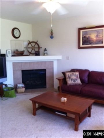2250 Indian Reno, NV 89521 - Photo 5 of 13 a living room with furniture and a fireplace