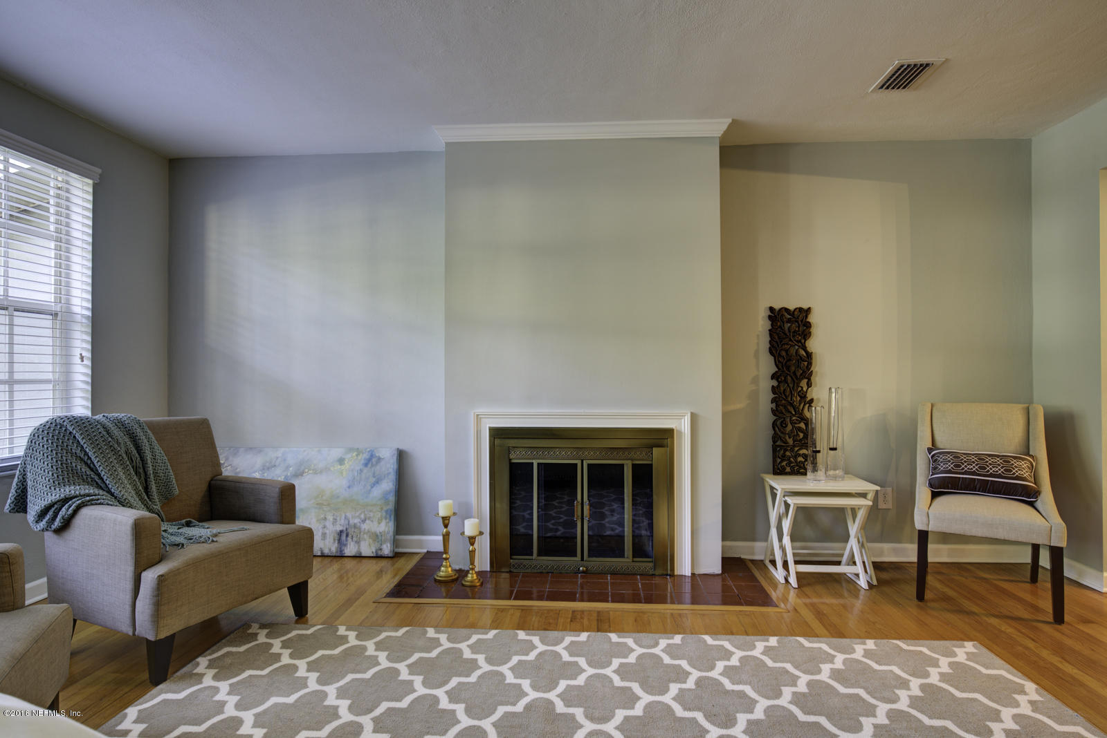 1726 Clemson Road Jacksonville, FL 32217 - Photo 10 of 44 a living room with furniture and a fireplace
