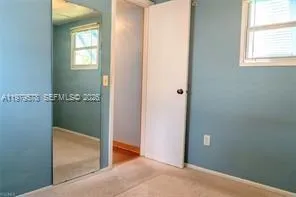 an empty room with window